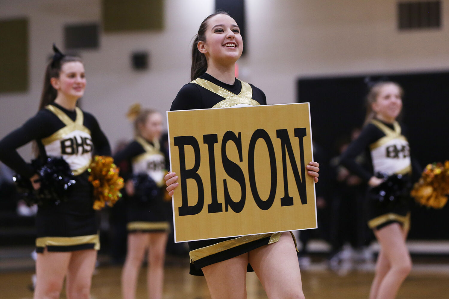 Zoie Bonczkowski holds up a Bison sign